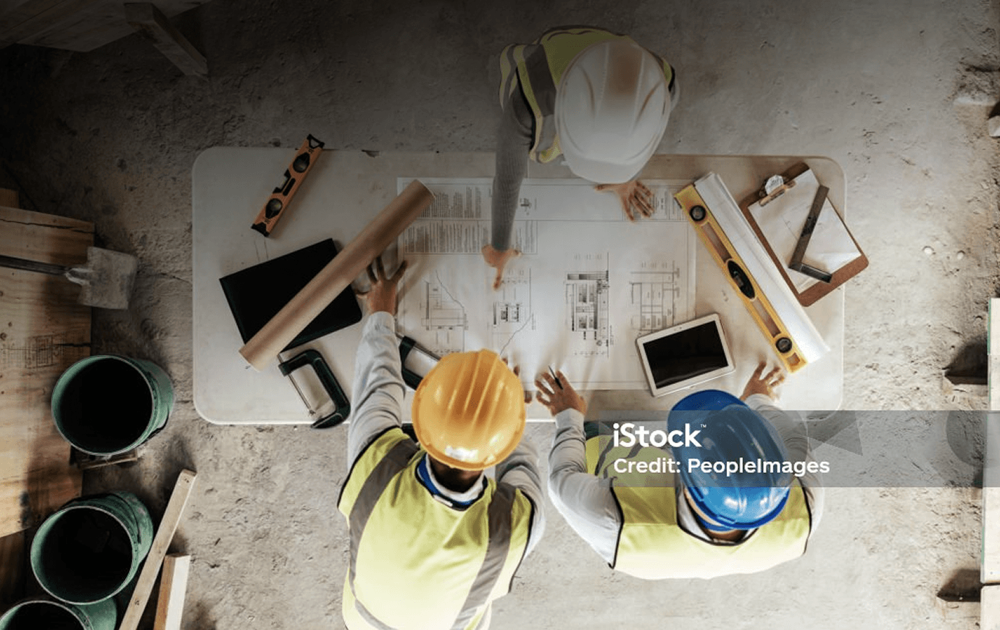 Engineers reviewing structural plans