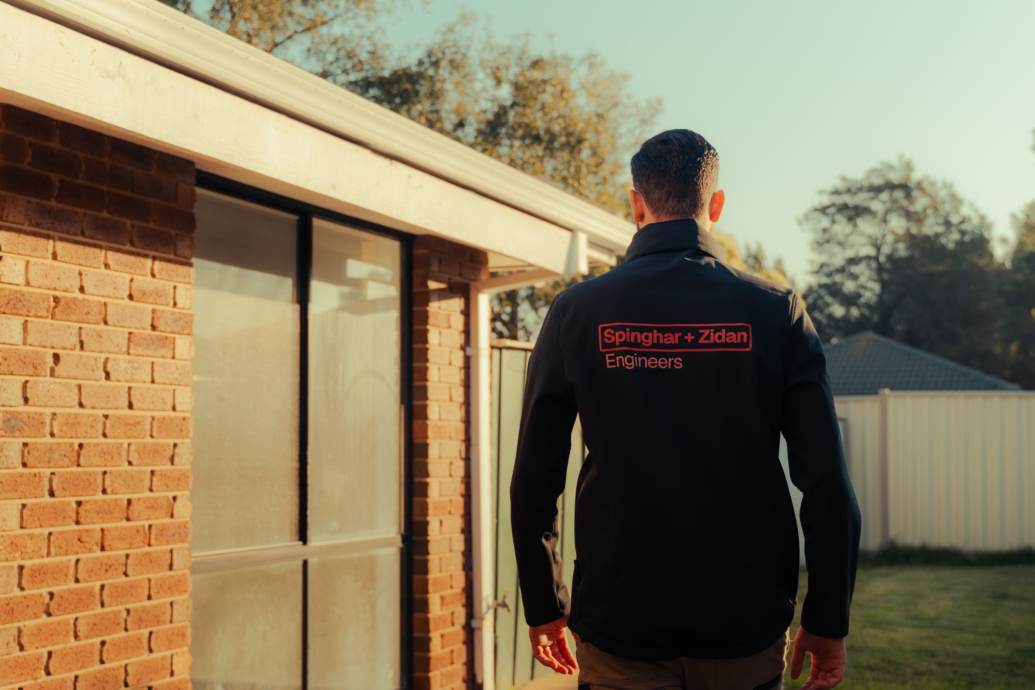 SZE engineer on site at a residential property.