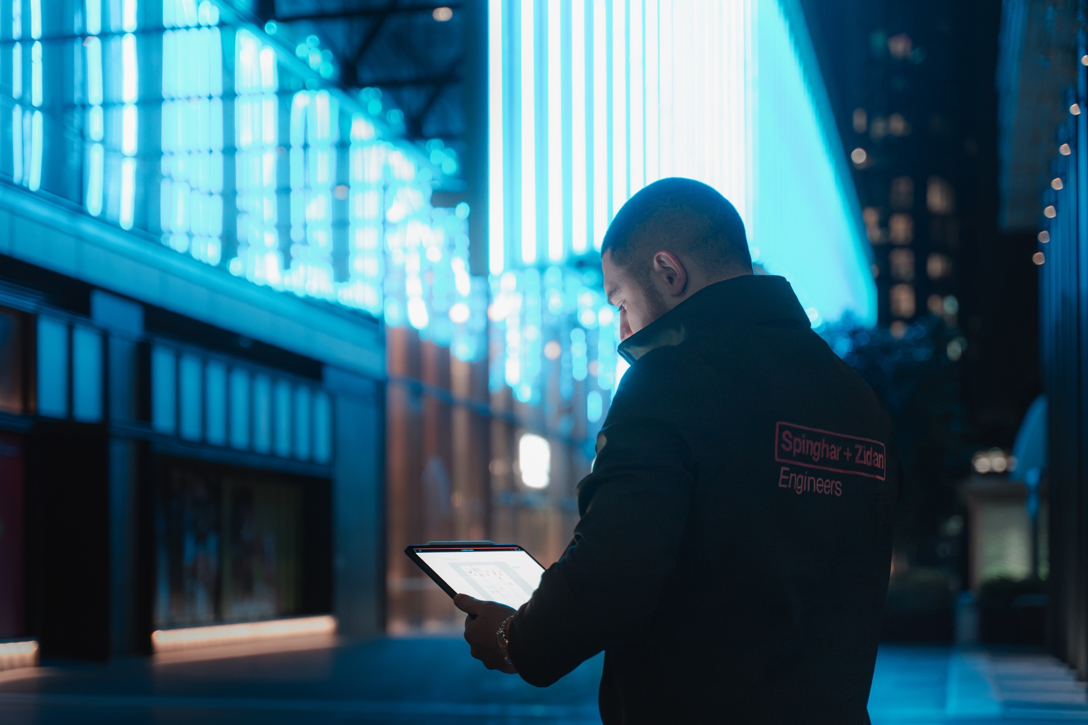 Night urban site with commercial buildings for portfolio claims.